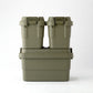 Two green TRUNK CARGO 20L plastic storage boxes stacking on a green TRUNK CARGO 50L plastic storage box