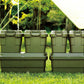 Six green camping storage boxes with different capacities stacking up with their combination and sitting on the grass next to a tent